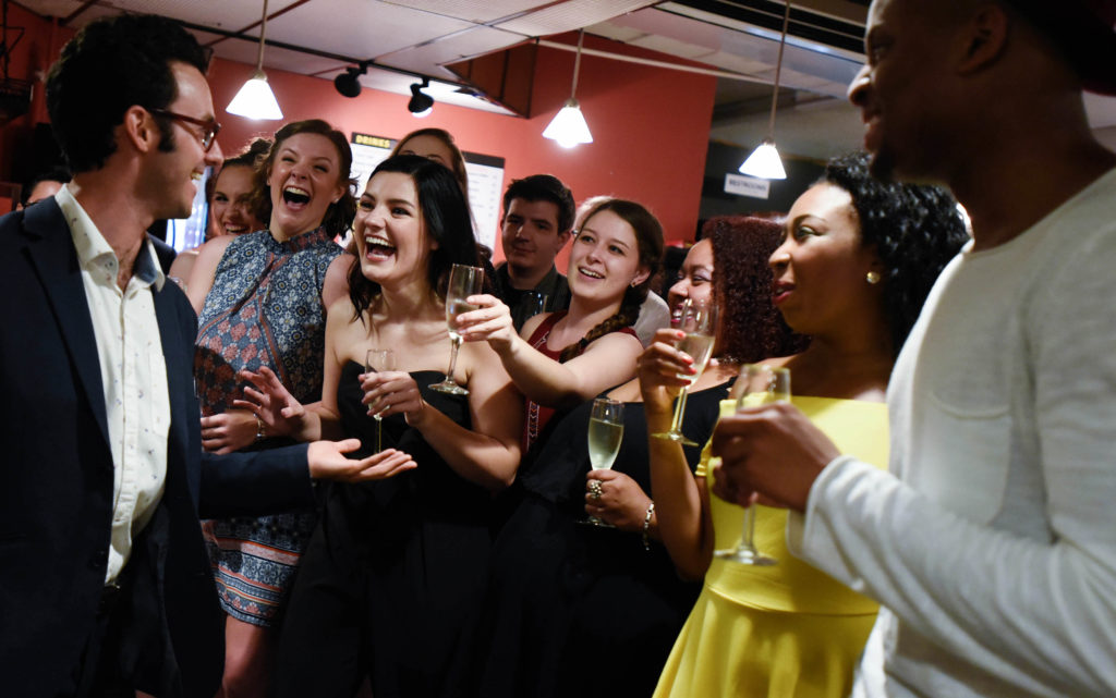 Mamma Mia! cast and crew members gather for a champagne toast after the show on the opening night