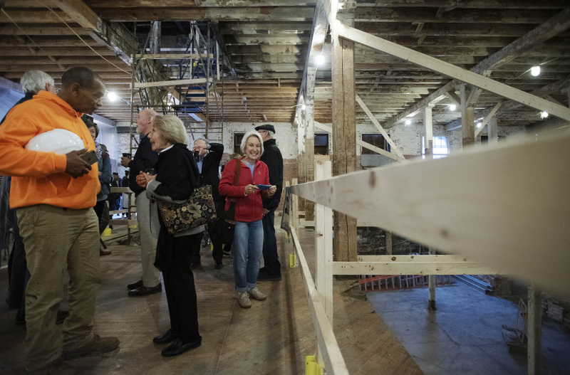 Attendees explore the space before a press conference announcing the beginning of the public campaign at the new home of theREP in Livingston Square in Albany Thursday, October 3, 2019.